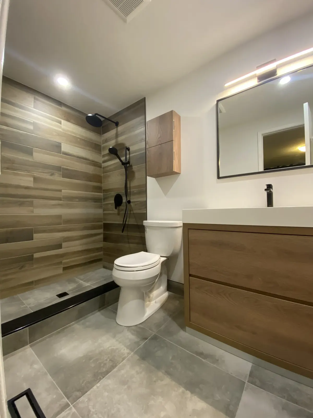 Shower with wood-look plank tile